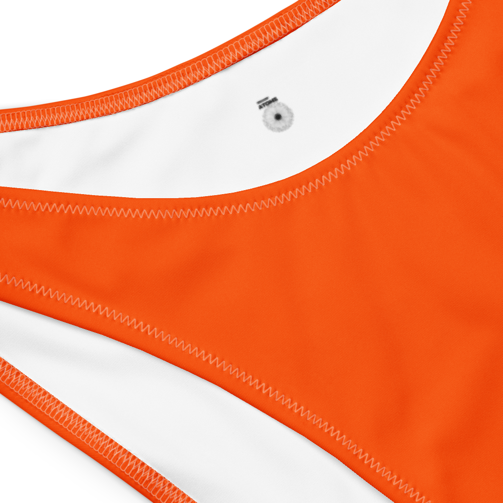 “Breakin’ Atoms Solar Flare Bandeau bikini in vibrant orange, front view”