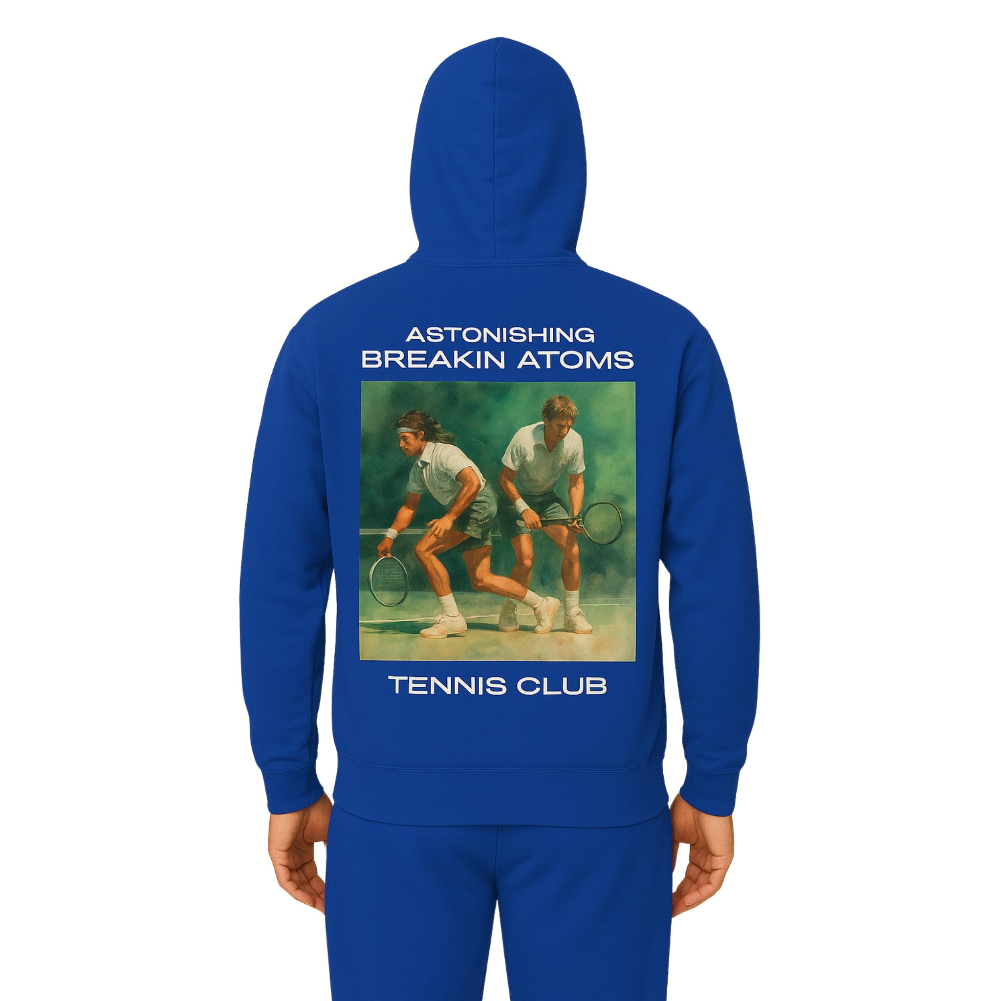 Model wearing the Astonishing Breakin’ Atoms "Tennis Club Sweater" — a classic crewneck with varsity-style lettering and retro tennis club branding, merging preppy sportswear with bold cultural streetwear.