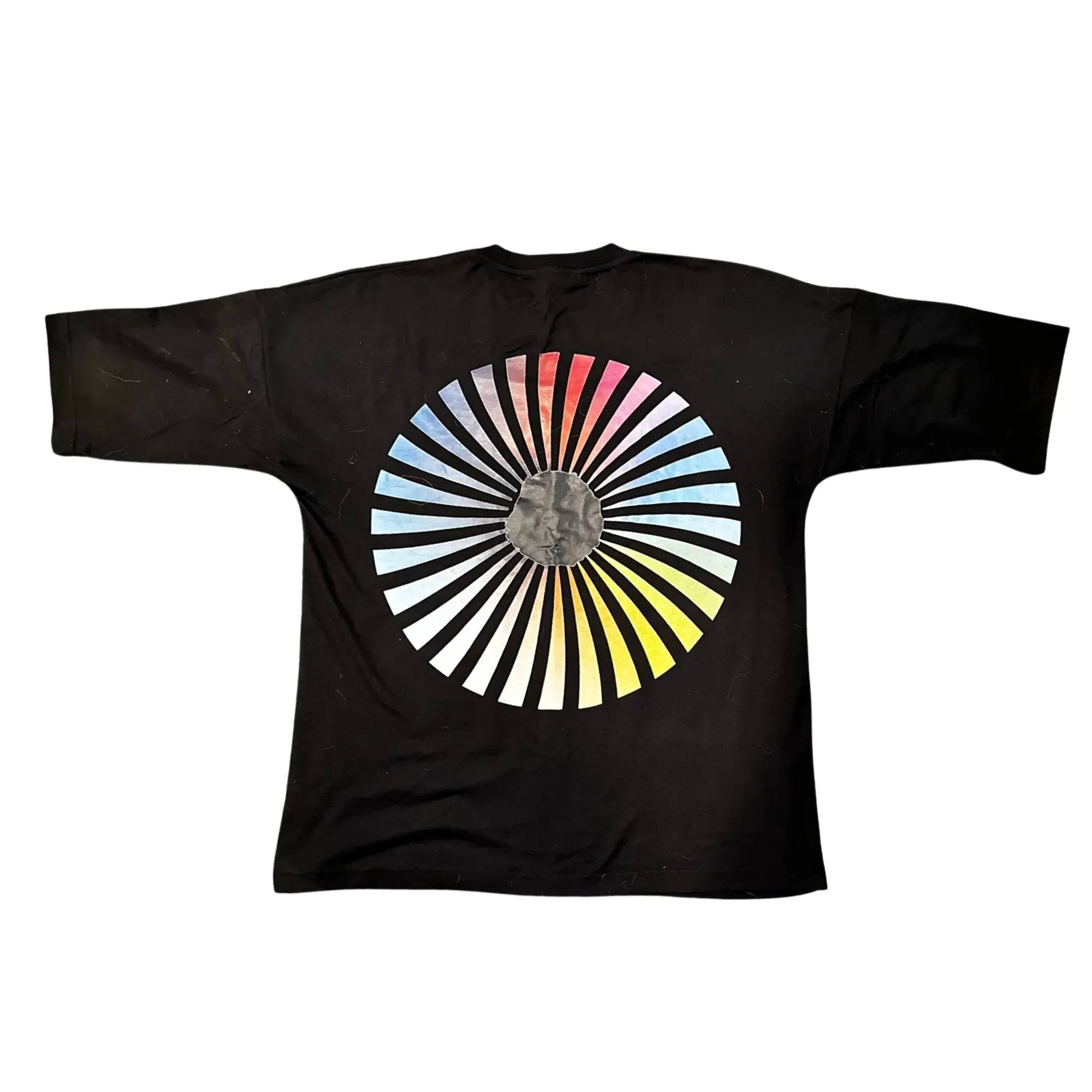 Model wearing Breakin' Atoms "Liberty Spectra T-Shirt," featuring a bold and artistic reimagining of the Statue of Liberty in vibrant tones — blending national symbolism with modern streetwear flair.