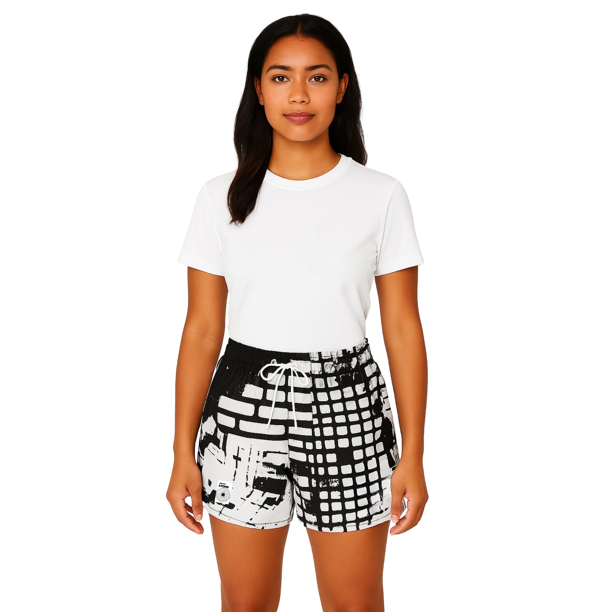 Female model in Breakin' Atoms "Dragon Lady Shorts," styled with monochrome abstract design, mid-thigh length, and relaxed fit — a unisex summer short perfect for expressive everyday outfits