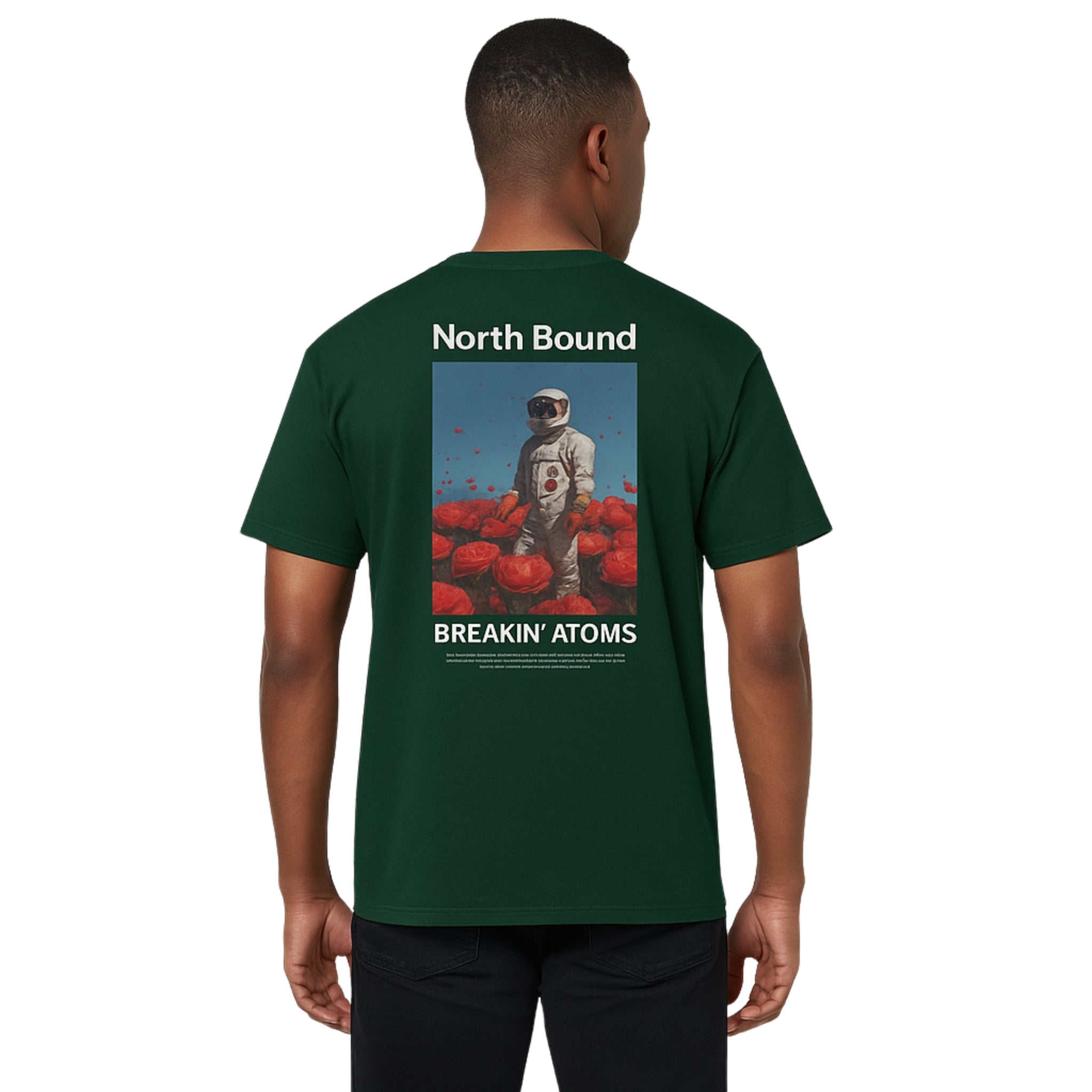 Model wearing Breakin' Atoms "Northbound" T-Shirt, featuring a minimalist yet directional graphic design centered on progress, purpose, and streetwear storytelling.