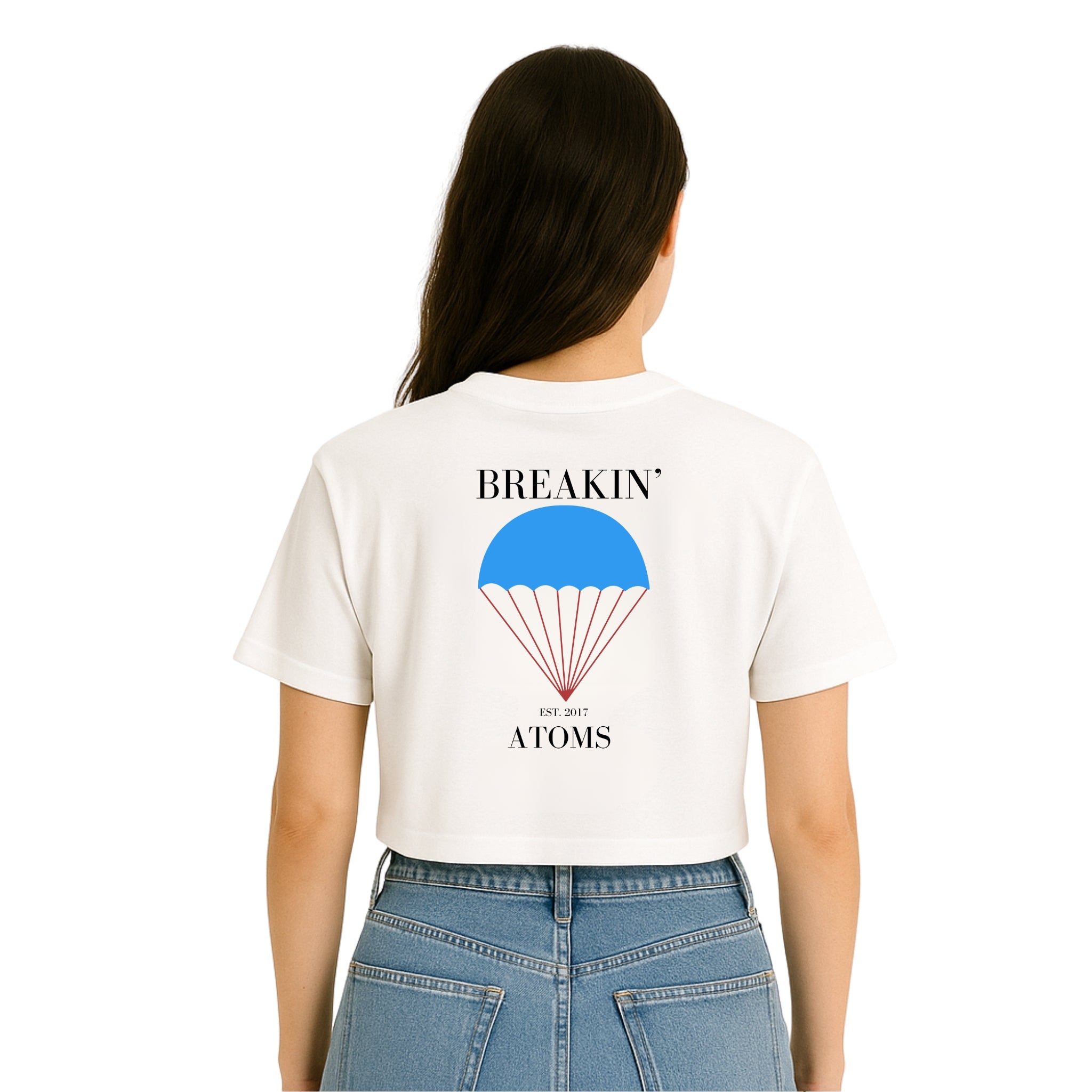 Back of Breakin' Atoms "Parachute Monogram Women's Crop Tee" highlighting the cropped silhouette and minimal finish — designed for versatile everyday wear with a bold streetwear edge.
