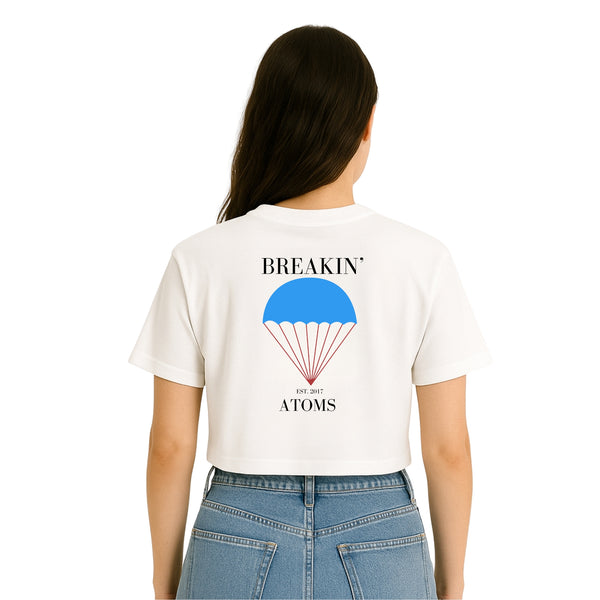 Back of Breakin' Atoms "Parachute Monogram Women's Crop Tee" highlighting the cropped silhouette and minimal finish — designed for versatile everyday wear with a bold streetwear edge.