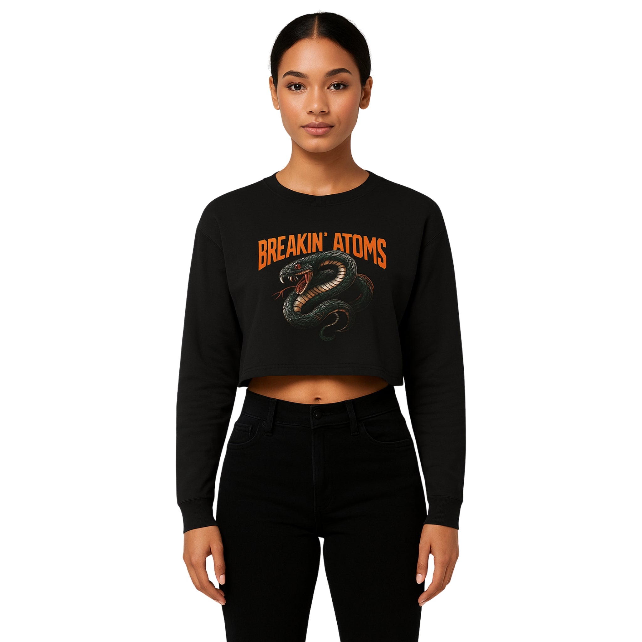 Model wearing Breakin’ Atoms "Serpent Strike Crop Top" — a bold, fitted cropped tee featuring a striking serpent graphic and clean typography, blending mystique, power, and sharp streetwear style.