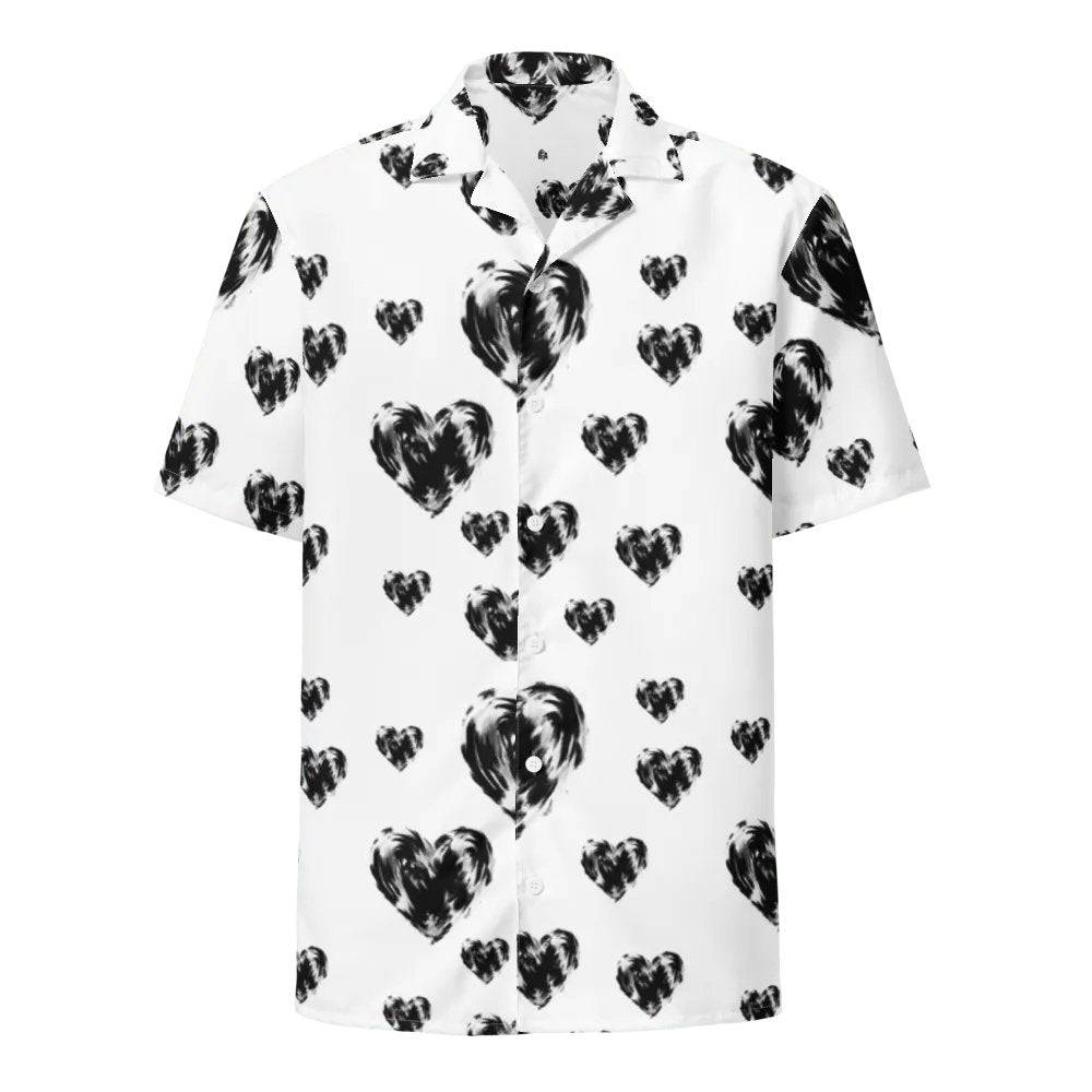 Model wearing Breakin' Atoms "Black Hearts Button-Up," a short sleeve shirt featuring an all-over dark heart motif on a sleek silhouette — blending romance and rebellion in elevated streetwear style.