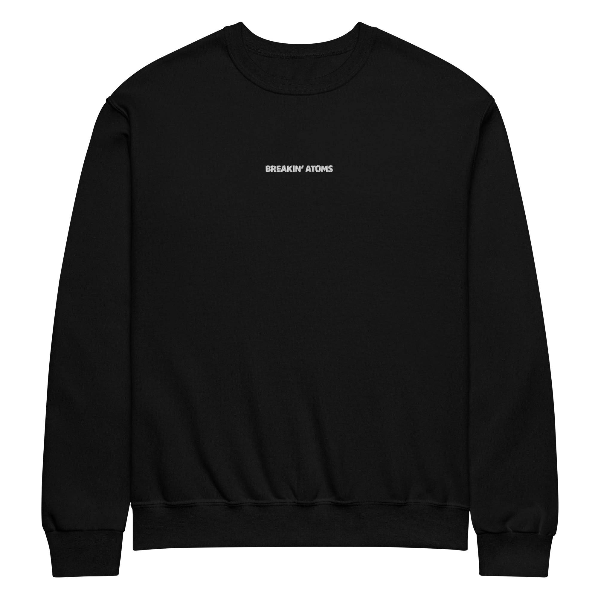 Model wearing Breakin’ Atoms "Silent Motion Crew-Neck Sweatshirt" — a minimalist, soft cotton-blend pullover with understated branding and sleek silhouette, ideal for quiet confidence and subtle streetwear edge.