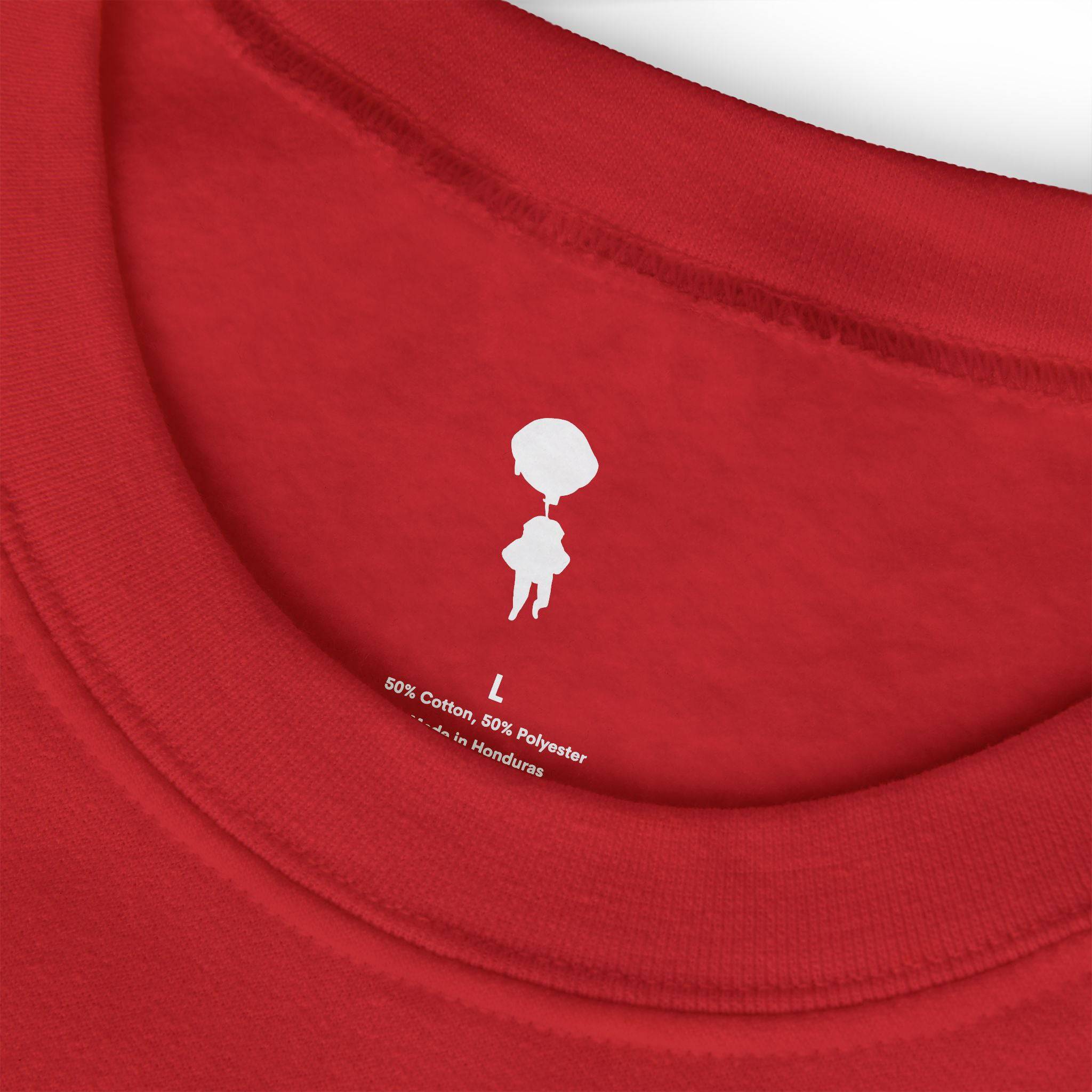 Model wearing Breakin' Atoms "The Cozy Classic" sweatshirt — a premium pullover in soft, heavyweight fabric with minimalist logo detailing, perfect for everyday comfort and elevated loungewear.