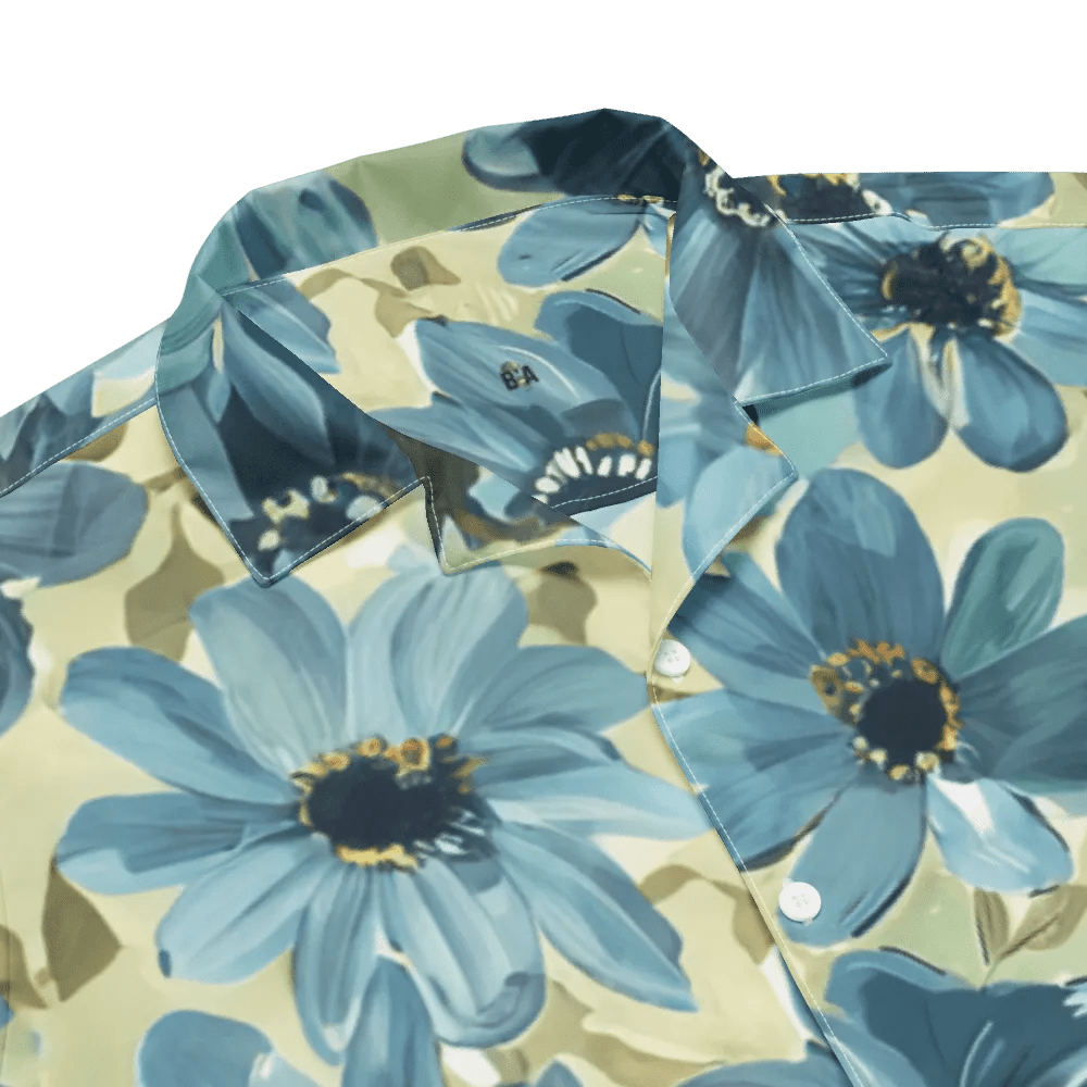 Model wearing Breakin' Atoms "Daisy Mosaic Vacation Button-Up," a lightweight short sleeve shirt with all-over abstract daisy floral print and relaxed fit — ideal for tropical getaways and summer street style.
