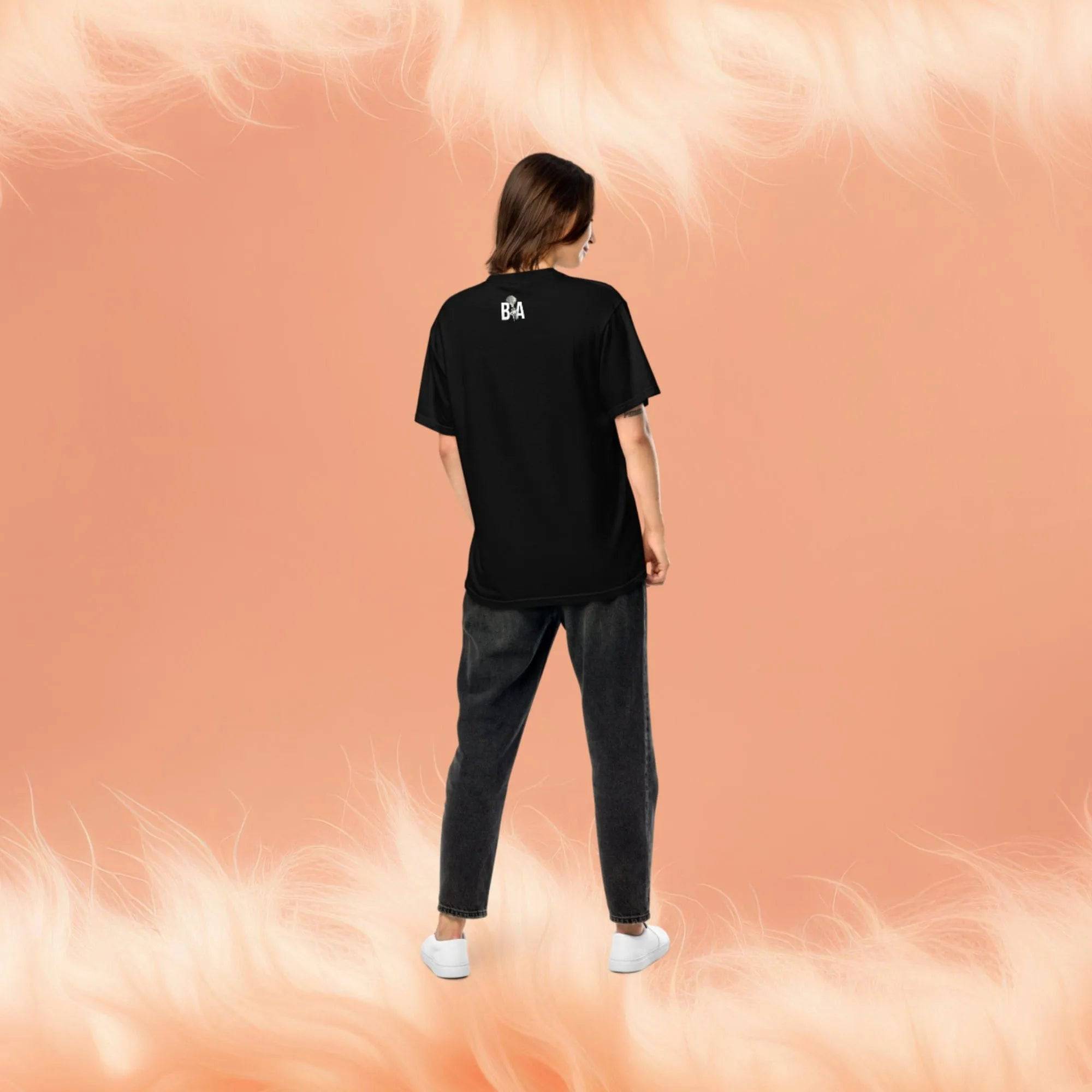 Model wearing Breakin' Atoms "Pixelated Mona Tee," a modern short sleeve t-shirt featuring a pixelated twist on the Mona Lisa — blending classic art with digital-age streetwear flair.