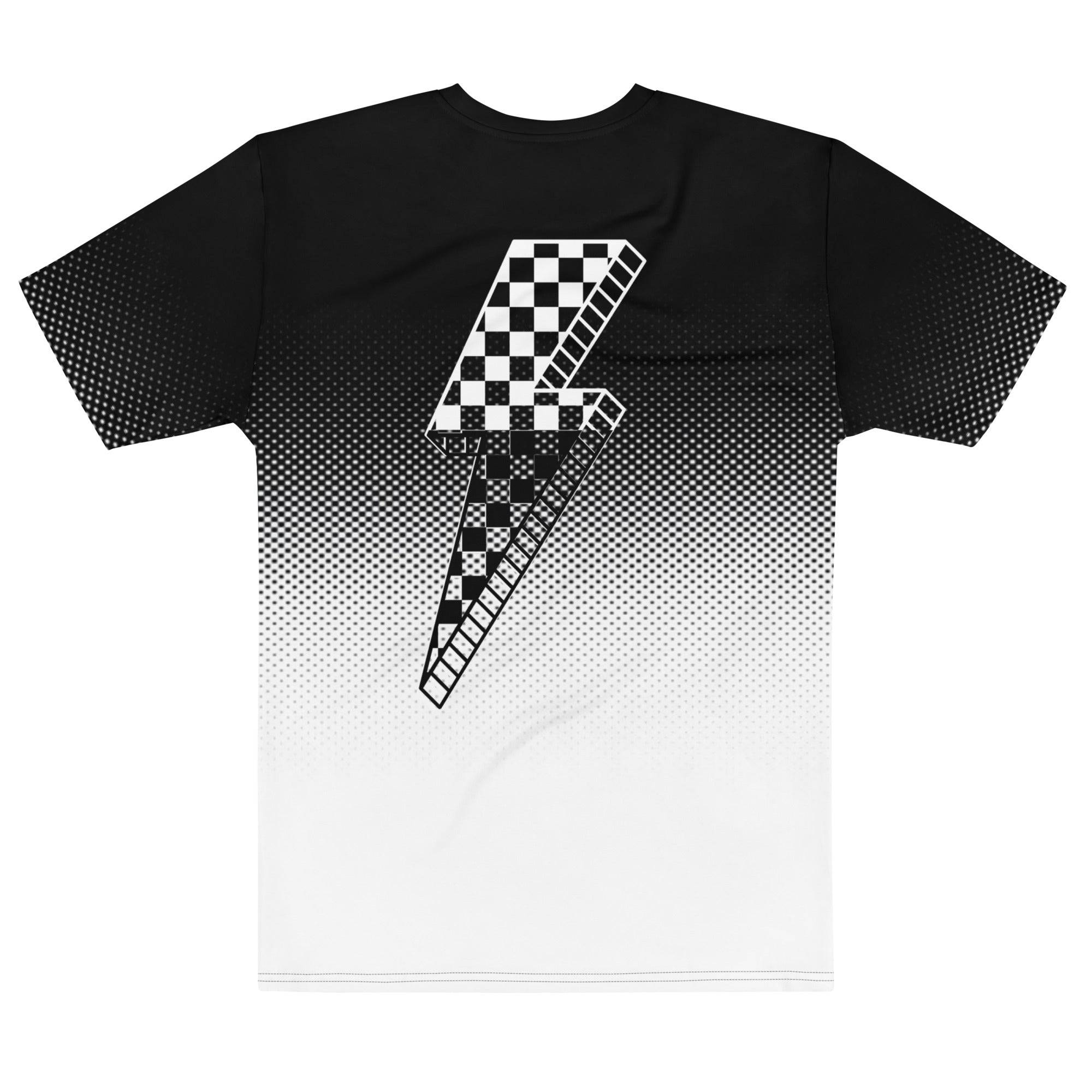 Model wearing Breakin' Atoms "Checker Charger Tee" — a racing-inspired streetwear t-shirt featuring bold checkerboard design, retro type graphics, and high-energy color contrast for a full-throttle aesthetic.