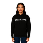 Woman wearing Breakin' Atoms cozy black pullover hoodie with white embroidered logo thumbnail 4