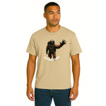 Model wearing Breakin' Atoms "Astral Expedition T-Shirt" — a cosmic-themed short sleeve tee with futuristic typography and space exploration graphics, symbolizing adventure, curiosity, and bold style. thumbnail 1