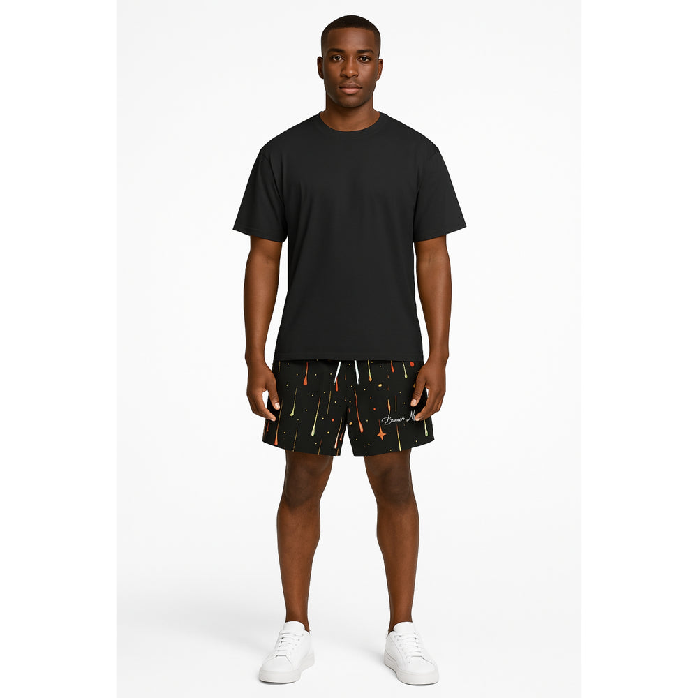 Model wearing Breakin' Atoms "Aurora Drops Shorts," featuring a vibrant, colorful drip-print inspired by the aurora borealis — a statement streetwear piece with cosmic energy and movement. — Breakin Atoms premium streetwear