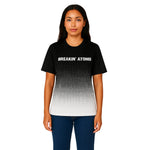 Model wearing Breakin' Atoms "Checker Charger Tee" — a racing-inspired streetwear t-shirt featuring bold checkerboard design, retro type graphics, and high-energy color contrast for a full-throttle aesthetic. thumbnail 1