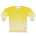 Breakin' Atoms "Canary Yellow Sweater" shown in flat lay, featuring a soft yellow-to-white gradient design, ribbed cuffs and hem, and a minimalist branded patch near the waist. thumbnail 2