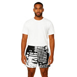 Model wearing Breakin' Atoms "Dragon Lady Shorts," black and white abstract print athletic shorts featuring a drawstring waistband and grid-style graphic design for bold streetwear or summer styling. thumbnail 2