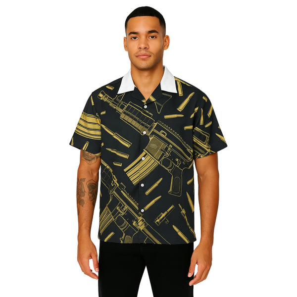 Model wearing Breakin' Atoms "Golden Arsenal Vacation Shirt," a short-sleeve button-up featuring a bold gold and black pattern inspired by power, strength, and luxury — perfect for resort wear or elevated summer outfits.