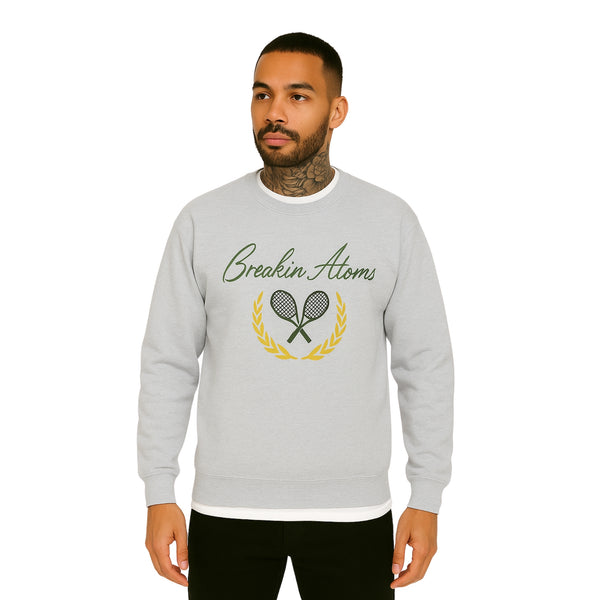 Model wearing Breakin' Atoms "Green Ace Heritage Sleeve," a long sleeve shirt with deep green tones and ace symbol detailing — merging classic iconography with modern streetwear fit.