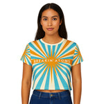 Model wearing Breakin' Atoms "Radiant Burst" Tee featuring a bold, sunray-inspired front graphic on a clean crew neck short sleeve silhouette — perfect for everyday statement streetwear. thumbnail 1