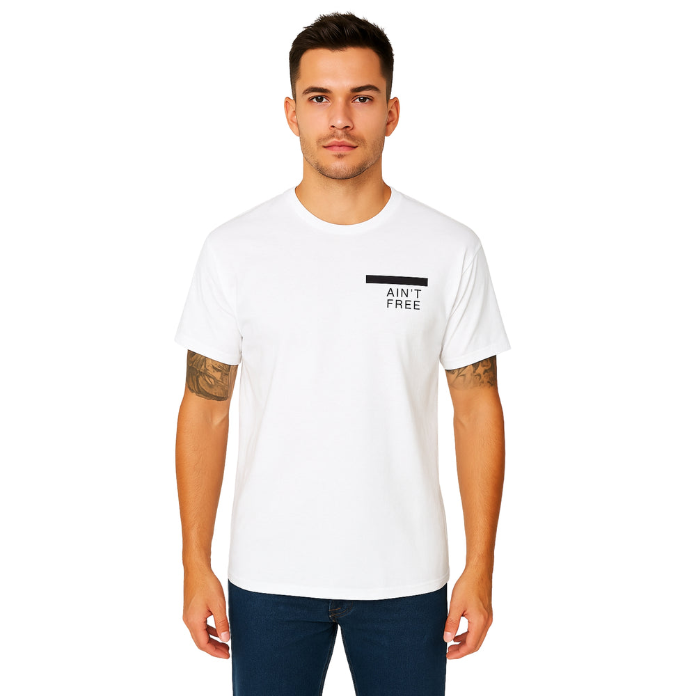 Model wearing Breakin' Atoms "Redacted Ain’t Free" Tee, a bold short sleeve t-shirt featuring censored text design that makes a powerful social statement — ideal for politically conscious streetwear. — Breakin Atoms premium streetwear