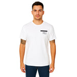 Model wearing Breakin' Atoms "Redacted Ain’t Free" Tee, a bold short sleeve t-shirt featuring censored text design that makes a powerful social statement — ideal for politically conscious streetwear. thumbnail 1