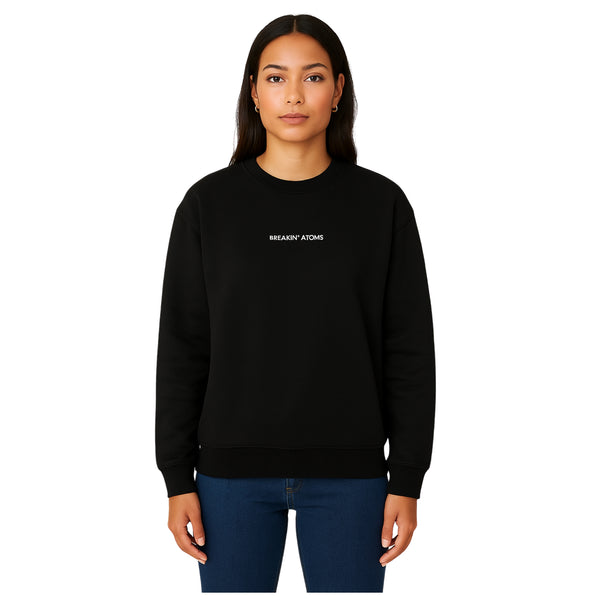 Model wearing Breakin’ Atoms "Silent Motion Crew-Neck Sweatshirt" — a minimalist, soft cotton-blend pullover with understated branding and sleek silhouette, ideal for quiet confidence and subtle streetwear edge.