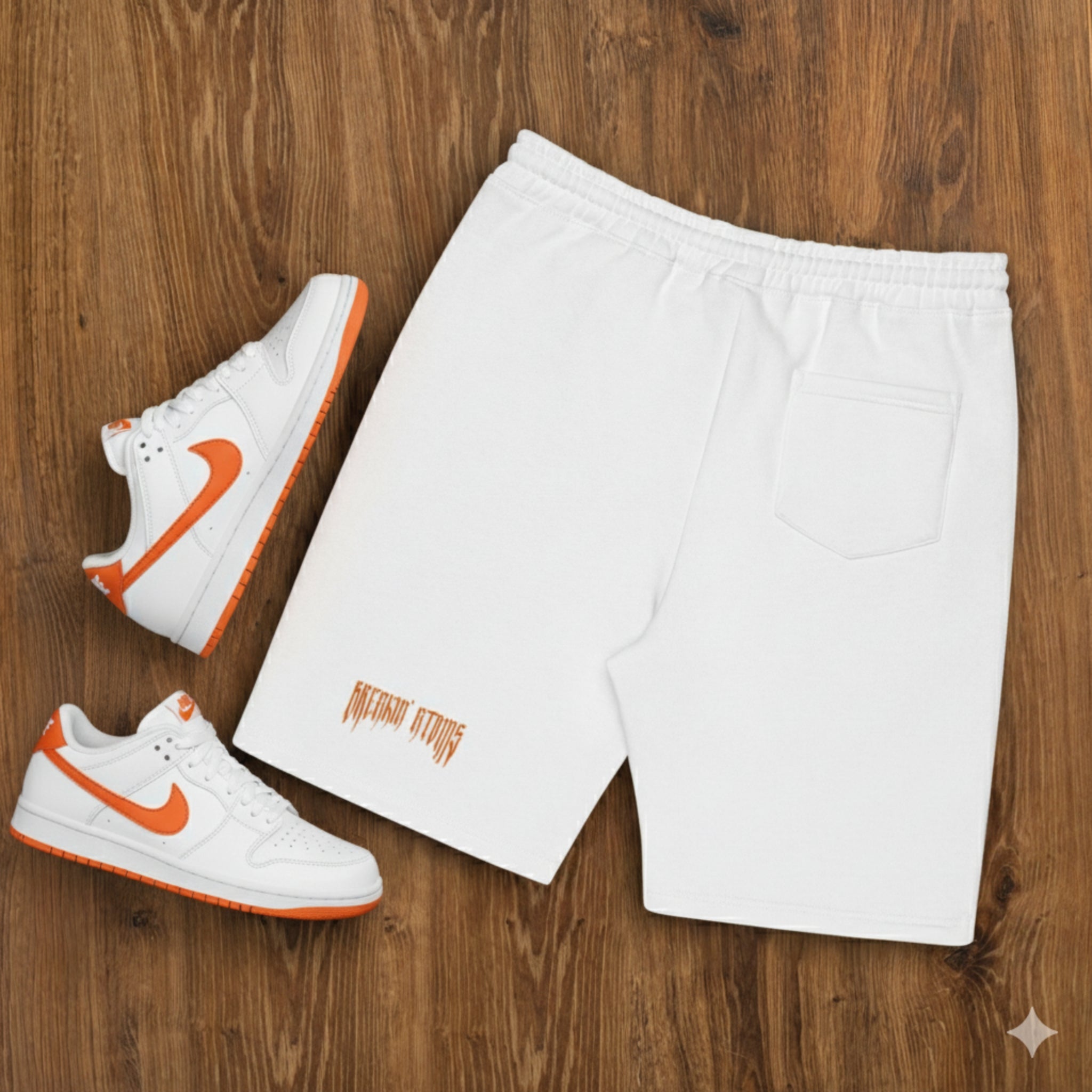 Model wearing black Breakin’ Atoms Twin Flam Shorts with twin red phoenix DTF prints on front thighs.