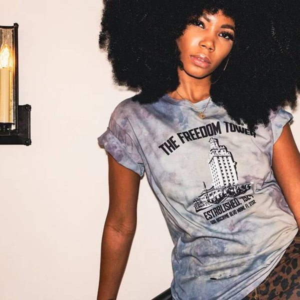 "Close-up of Freedom Tower graphic on Breakin' Atoms Ice Blue Tie-Dye T-Shirt – Bold design with urban streetwear appeal"